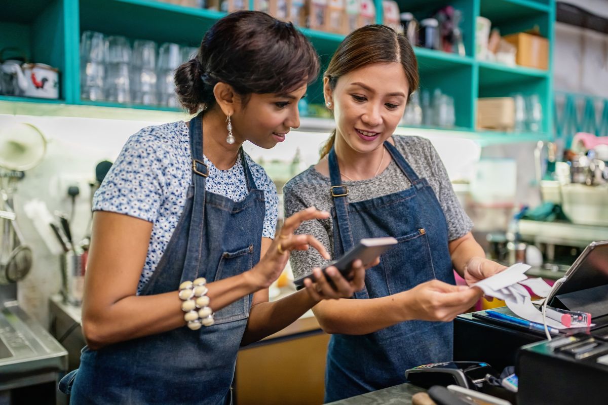 F&B staff talking to each other to figure out how to collect customer data easily