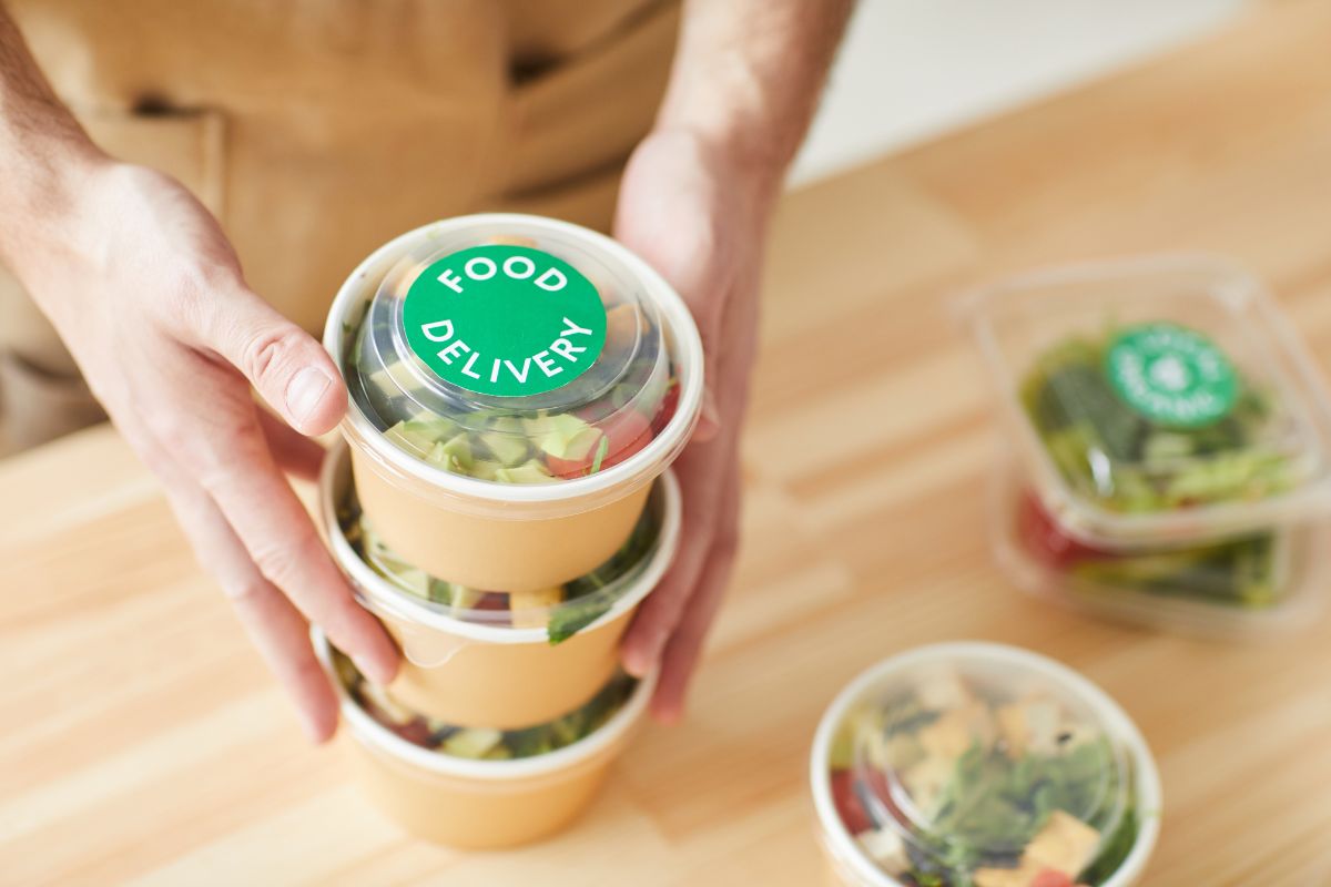 A F&B business owner packing an order