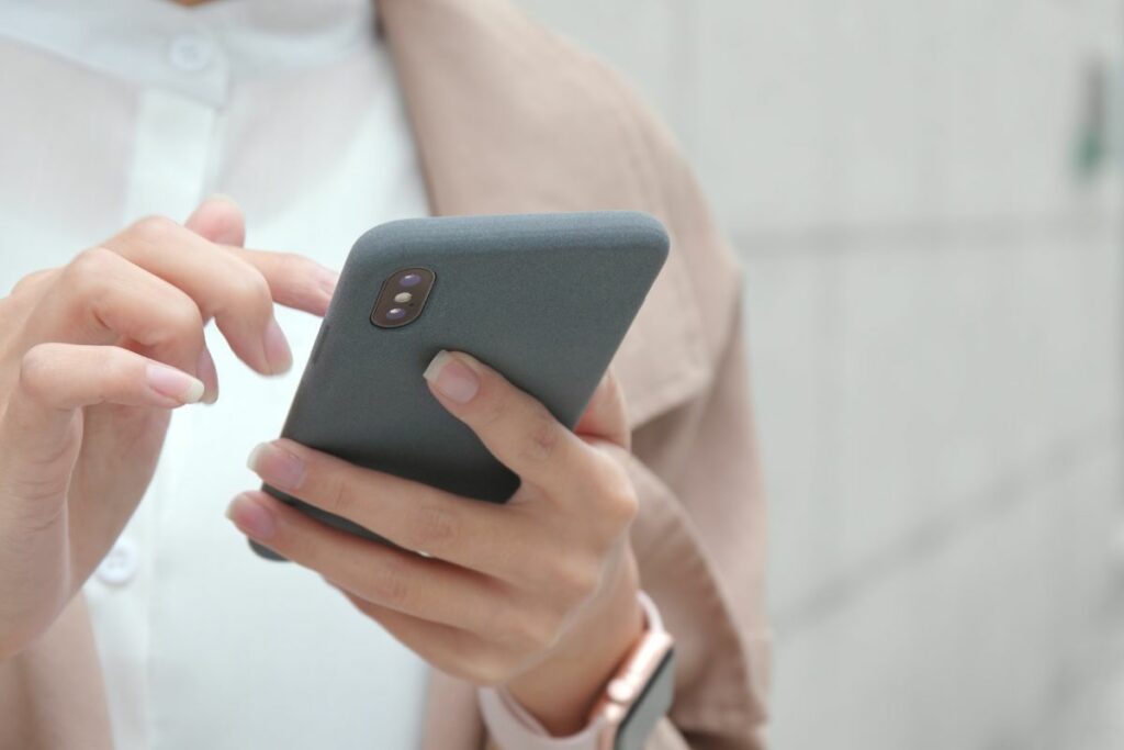 A woman using her phone