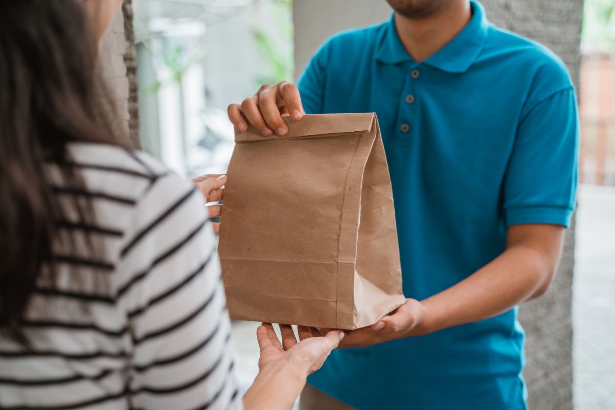 A Malaysian delivery rider doing food delivery