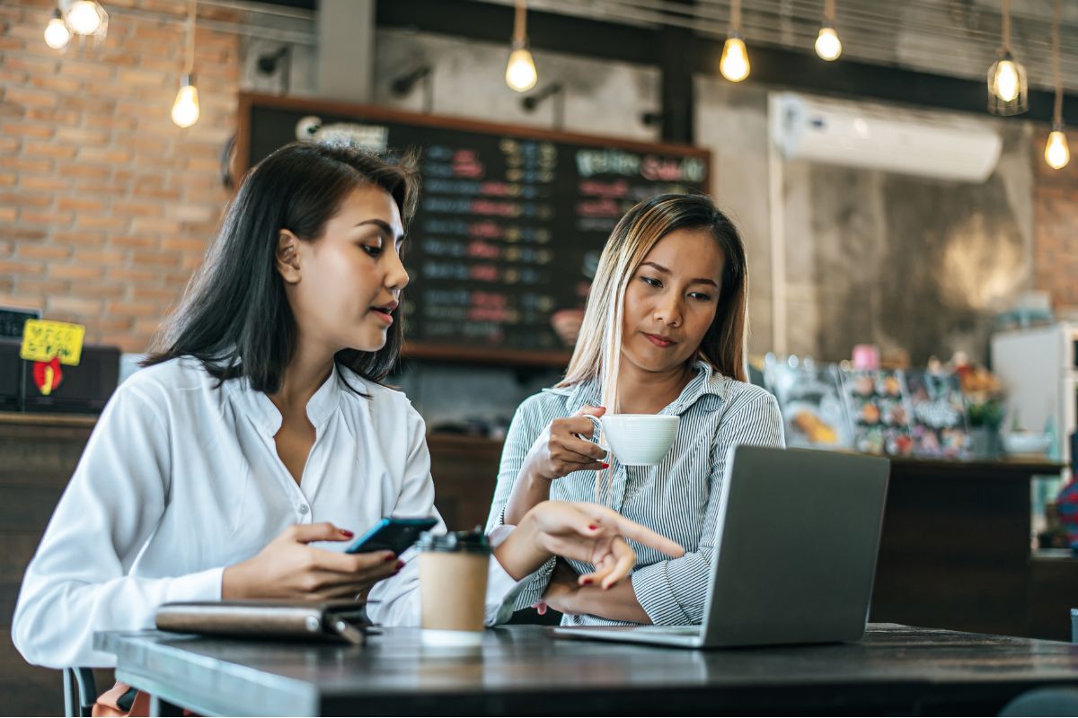 Two business owners working in a cafe