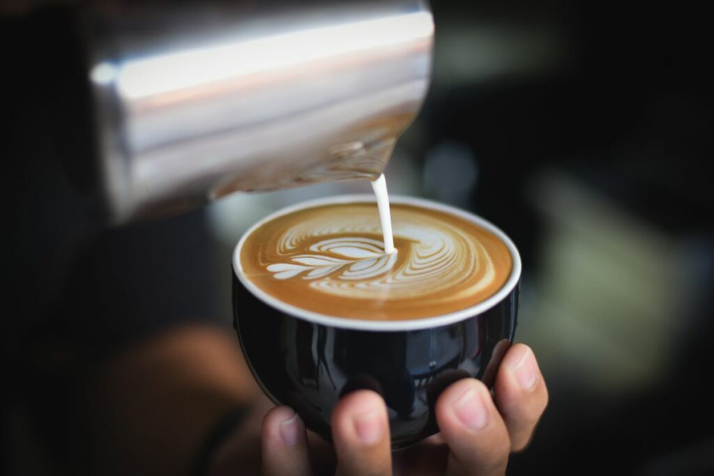 A barista making coffee