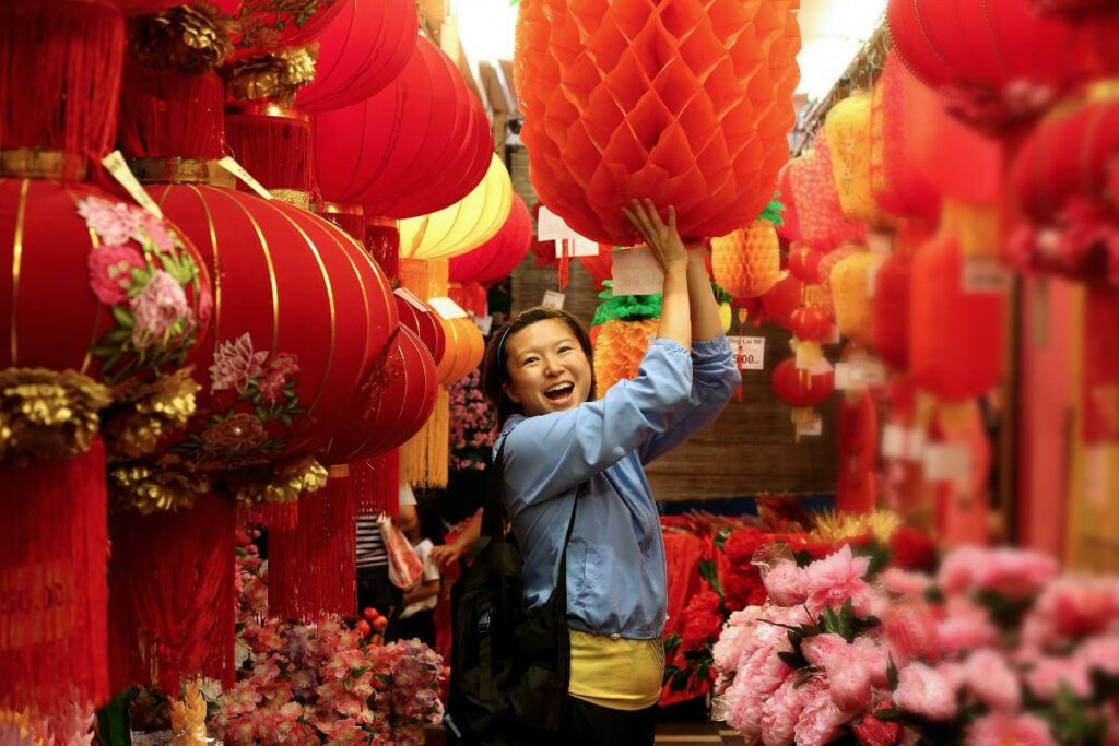 A girl shopping for Chinese New Year celebrations