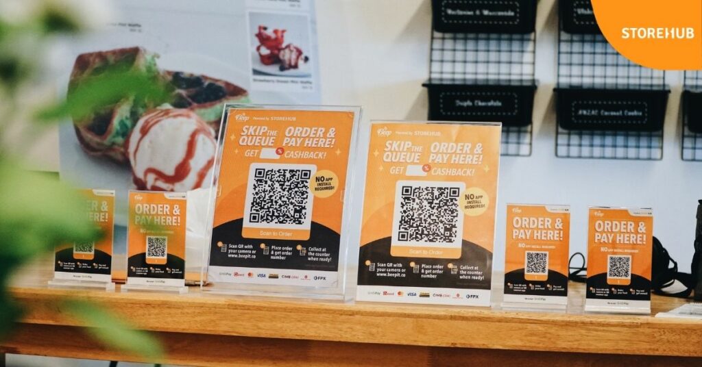 Beep QR Order standees in an ice-cream cafe