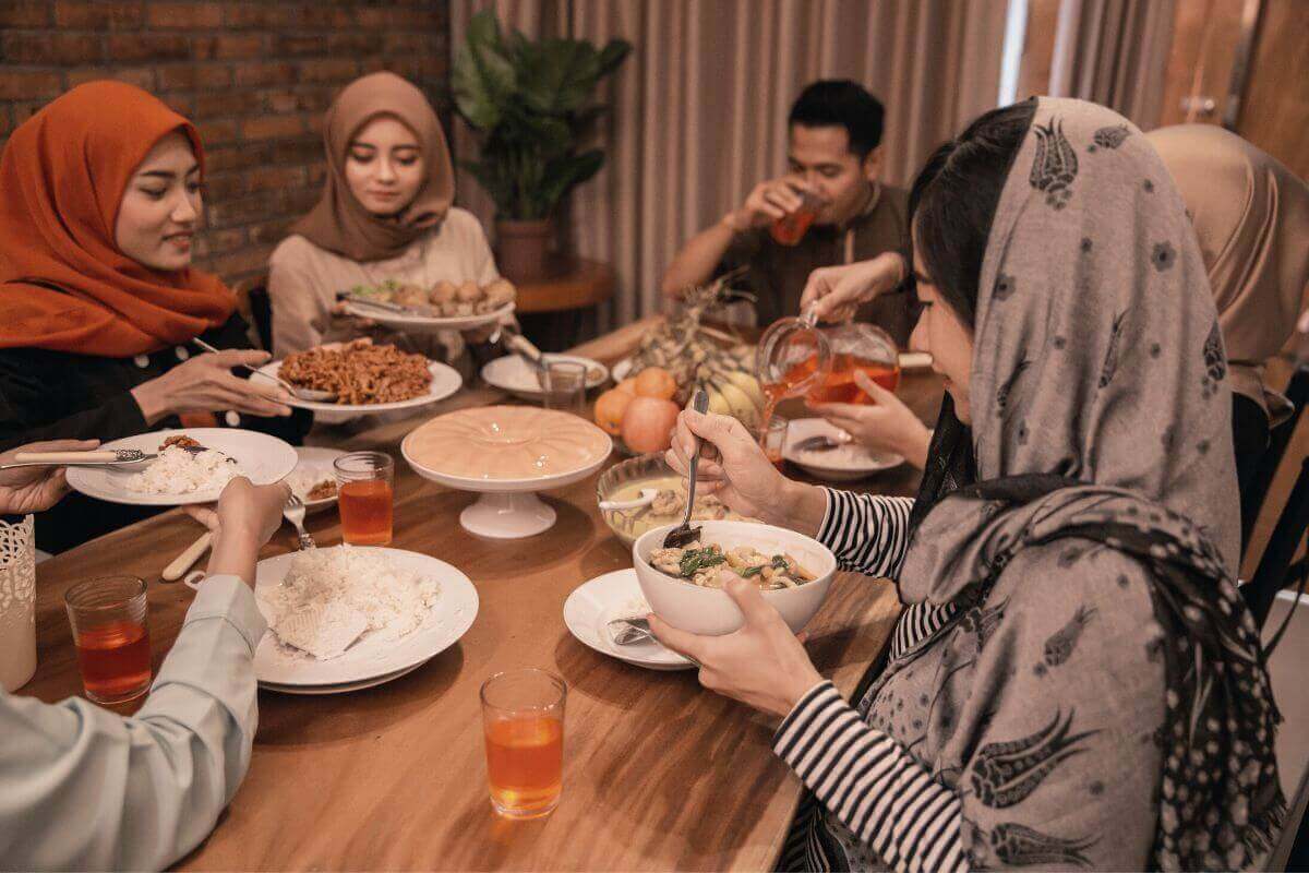 A family who is breaking fast together during Ramadhan