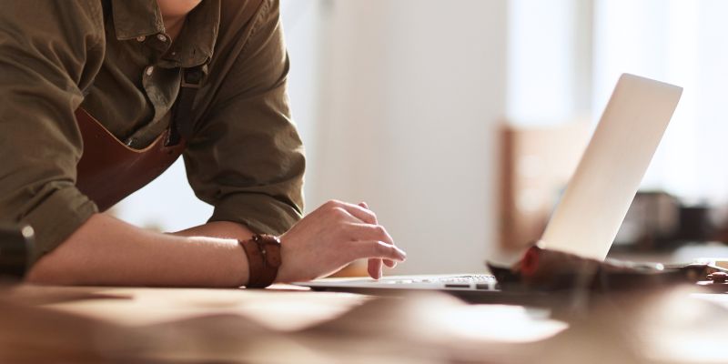 A person using her laptop