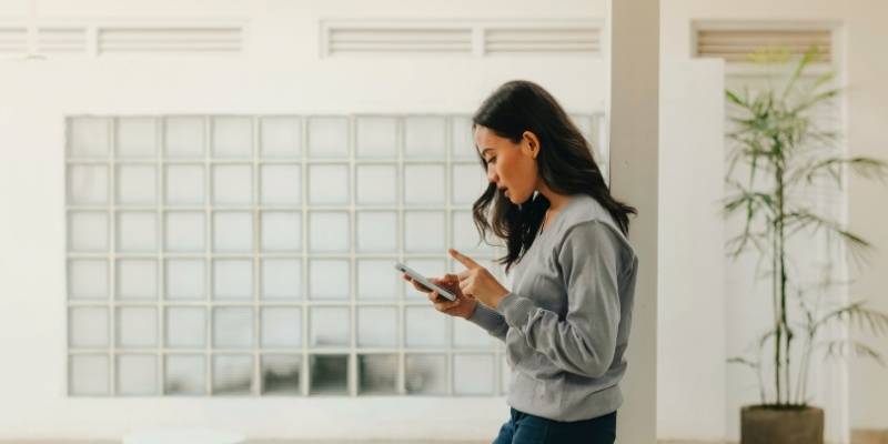 A woman using her phone