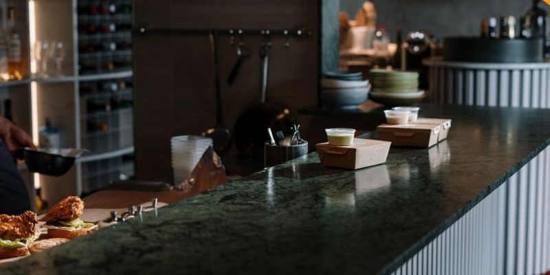 Interior of a restaurant with takeaway food on the counter