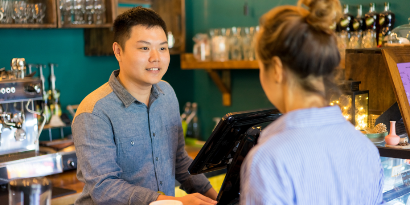 Customer interacting with F&B business operator