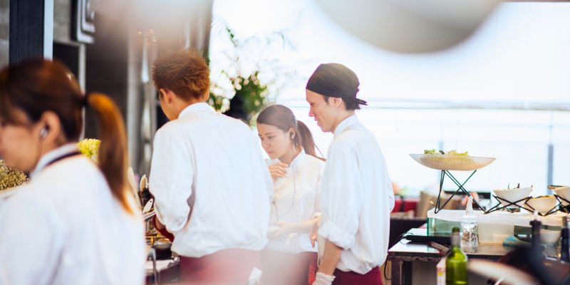 Restaurant staff having a meeting