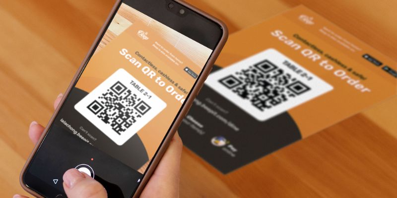 A Malaysian customer scanning the QR Order & Pay code in a F&B business
