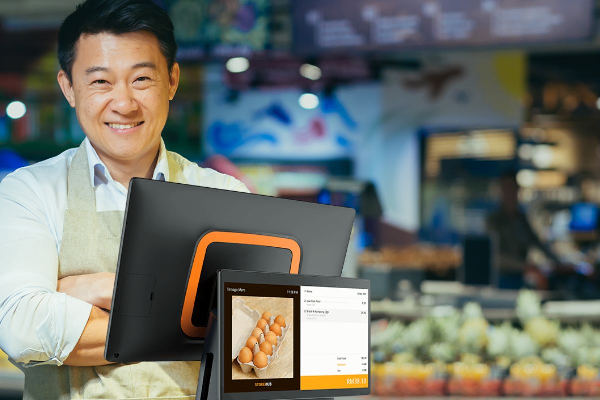 Malaysian business owner with a StoreHub POS system