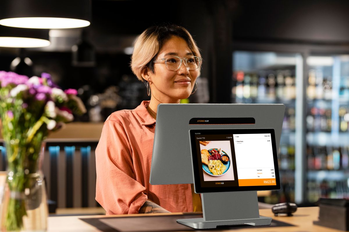 A Malaysian business owner with a StoreHub POS system
