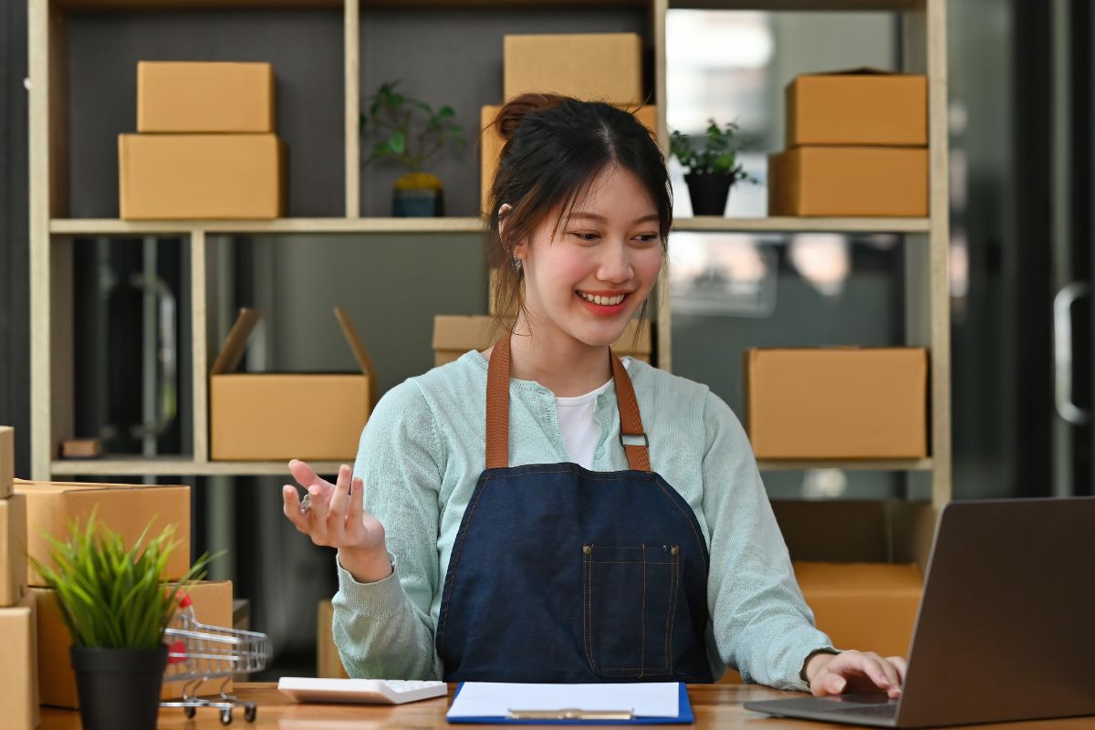 Malaysian woman running a small retail store online