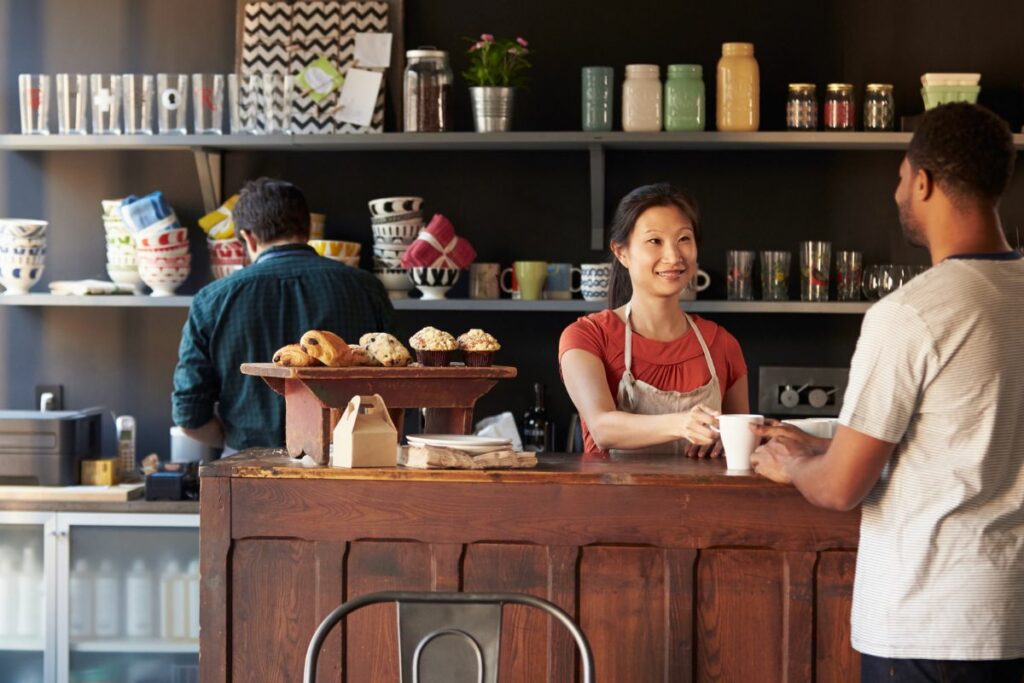 A woman serving a customer