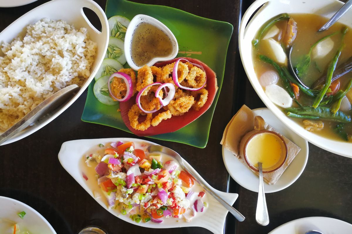 A spread of Filipino food at a restaurant