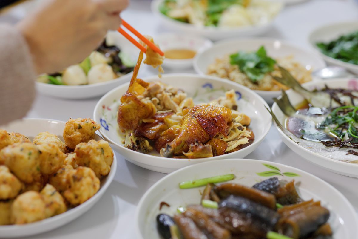 A Filipino woman eating food at home