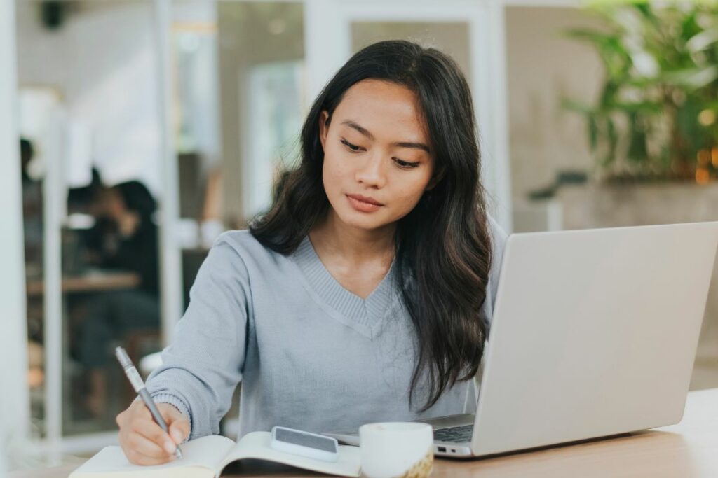 A Filipino woman doing her taxes