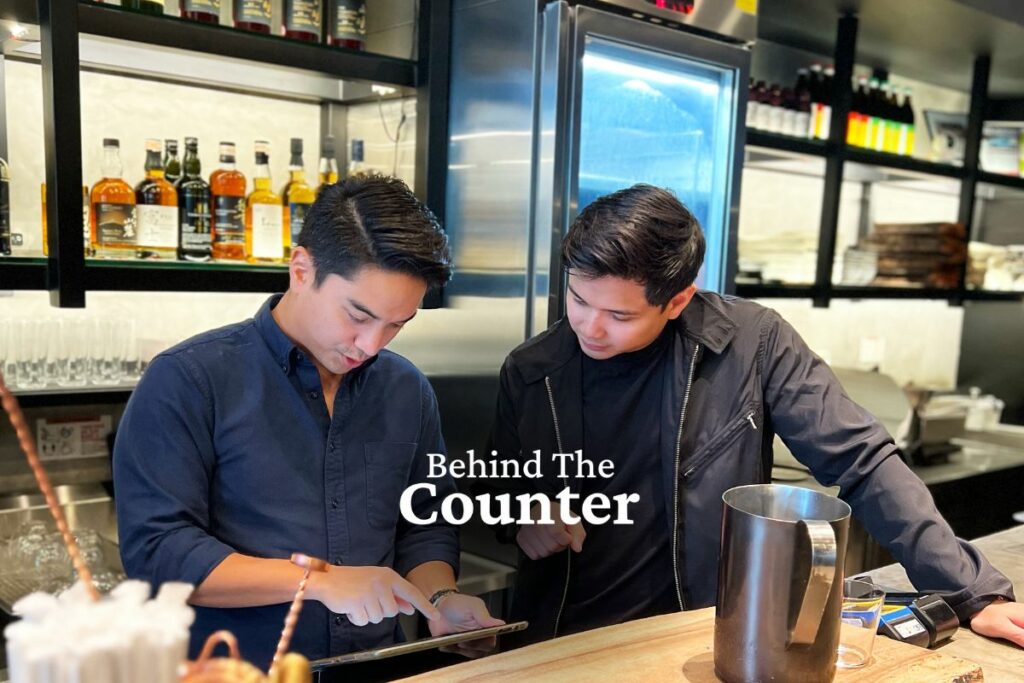 Pinoy business owners using a POS behind the counter