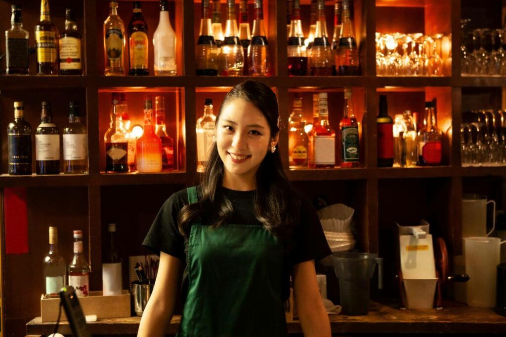 A happy Filipino restobar owner