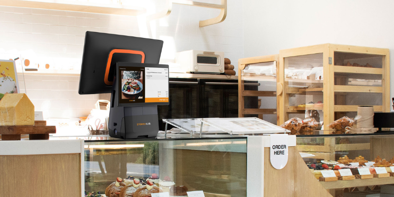 StoreHub POS on a counter in a bakery.