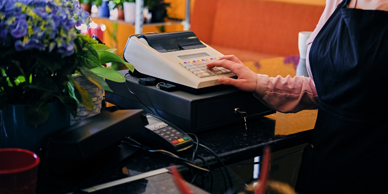 Business owner using a legacy system POS