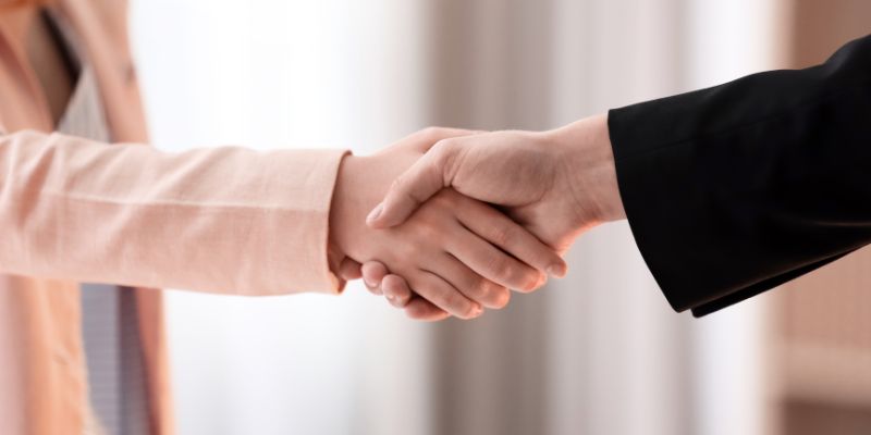 Two people shaking hands