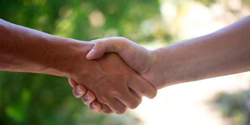 Two people shaking hands