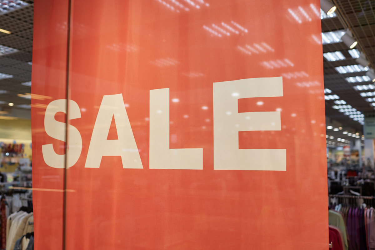 Red sale banner in a retail store