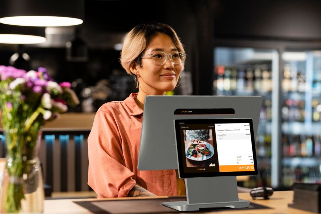 A Filipino business owner with a StoreHub POS system