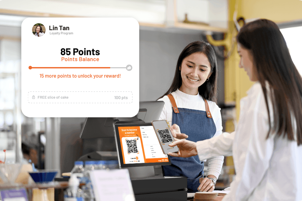 Filipino customer scanning QR code on a café POS to join StoreHub Loyalty membership program