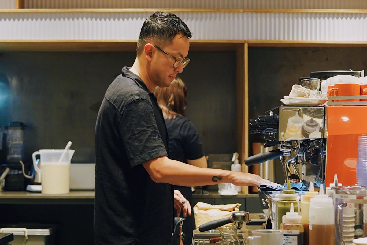 Andre Chanco, one of the founders of Yardstick Coffee, making coffee