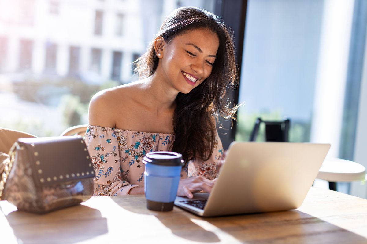 A Filipino small business owner on her laptop