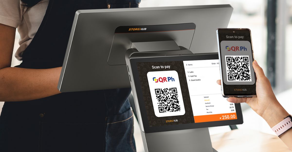 A customer making payment by scanning a QR Ph code on the StoreHub POS