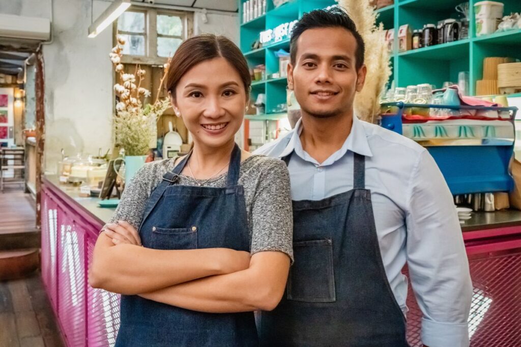 A Filipino couple working together in their restaurant