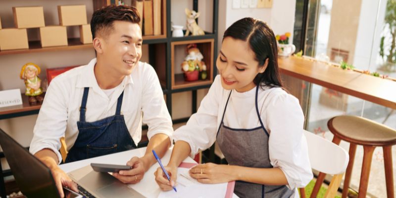Filipino business owners working together
