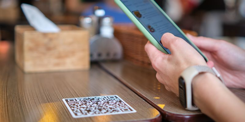 Customer scanning a QR code from their table.