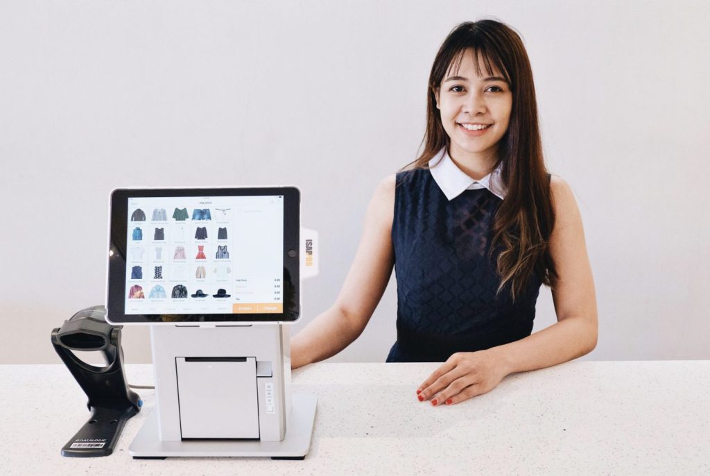 woman StoreHub POS system