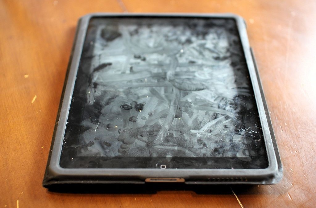 iPad with dirty screen full of fingerprints