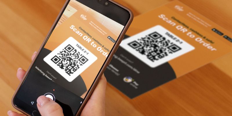 A person scanning a QR Code