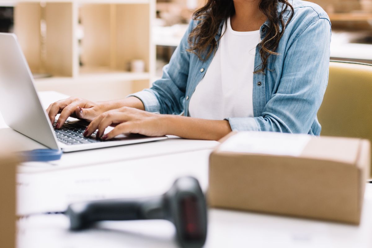 A Malaysian small business owner on her laptop