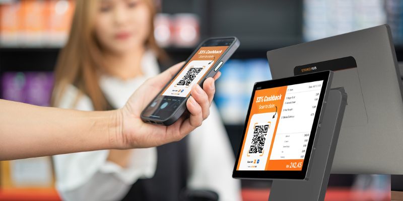 A customer claiming her cashback on a StoreHub POS